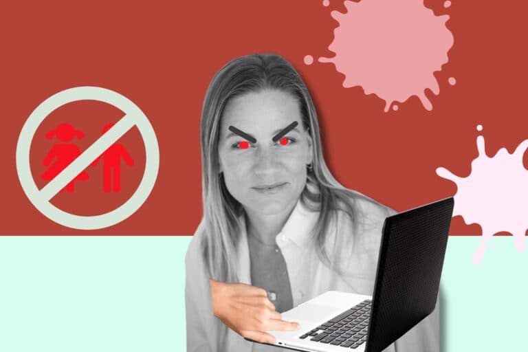 Andrea Jansen mit wütenden Teufelchenaugen vor dem Laptop mit einem Kinder-Verboten-Schild im Hintergrund.