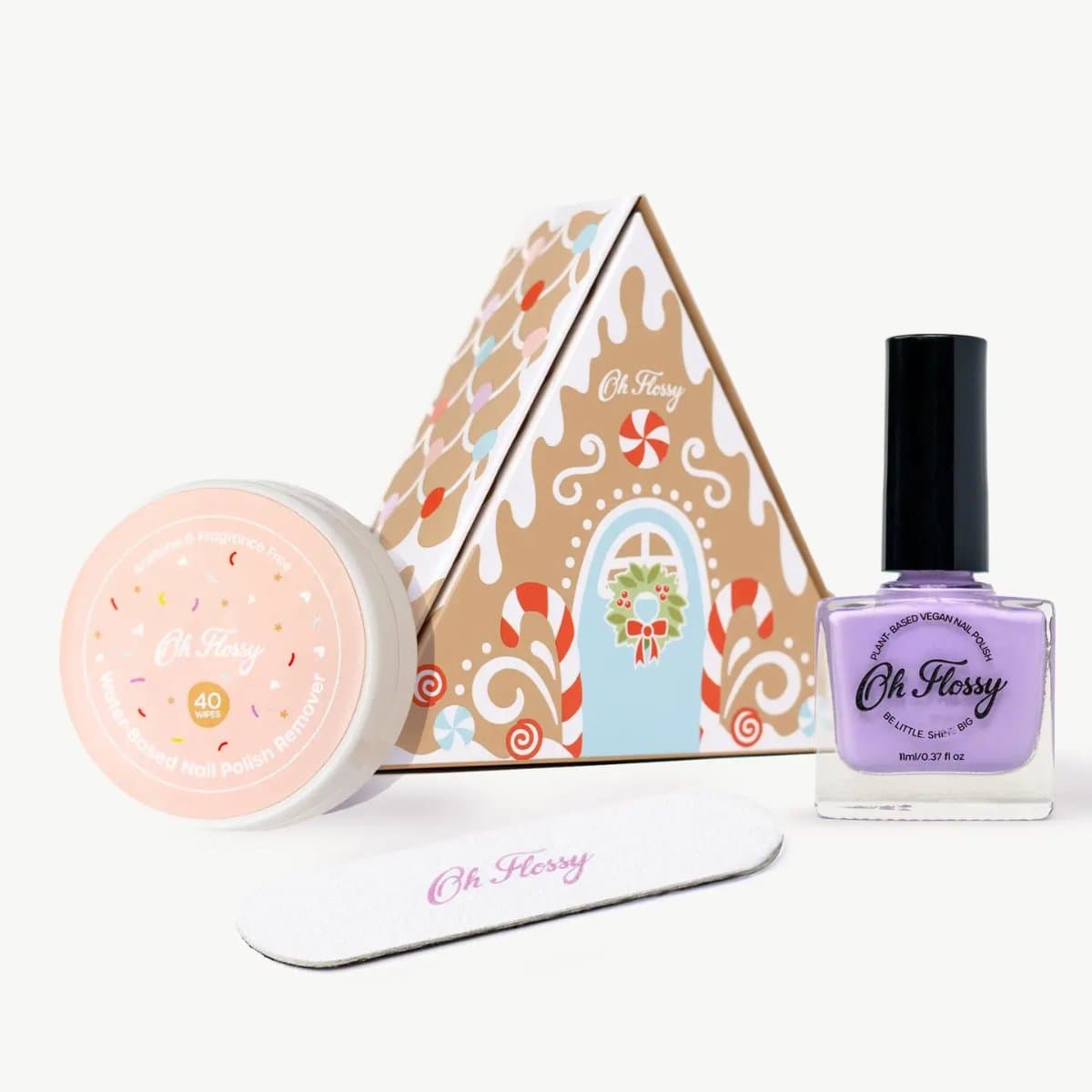 Mini-Maniküre-Set im Lebkuchenhaus-Look: fliederfarbener Kinder-Nagellack, acetonfreie Entferner-Tücher und Mini-Polierfeile. Vegan, ab 3 Jahren.